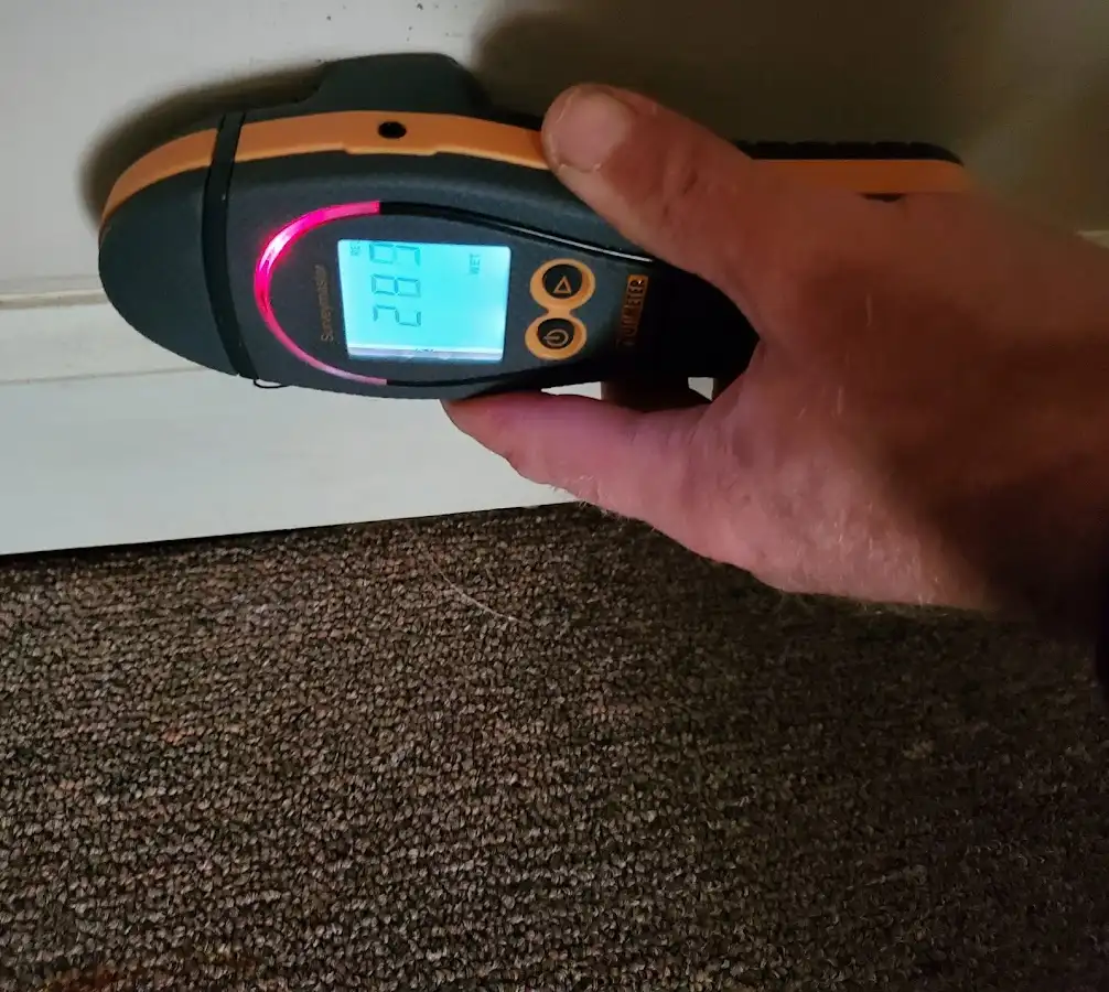 Moisture detection at baseboard during Mold Inspection & Testing in Fayetteville